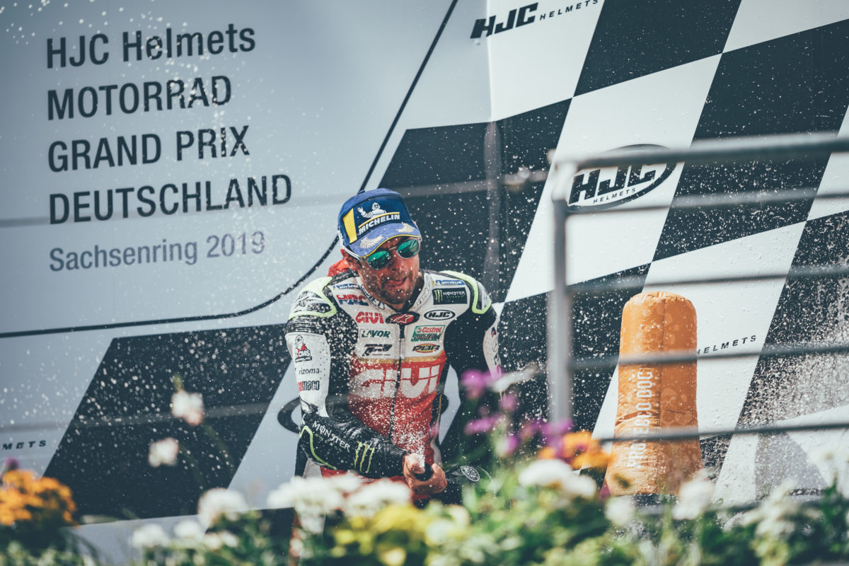 Cal Crutchlow celebrating his place on the podium in Sachsenring 